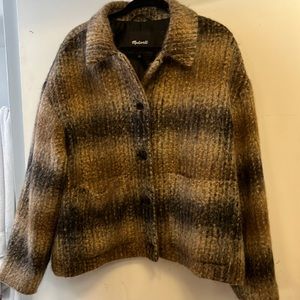 Lightweight.  Fall transitional outerwear.  Neutral colors.